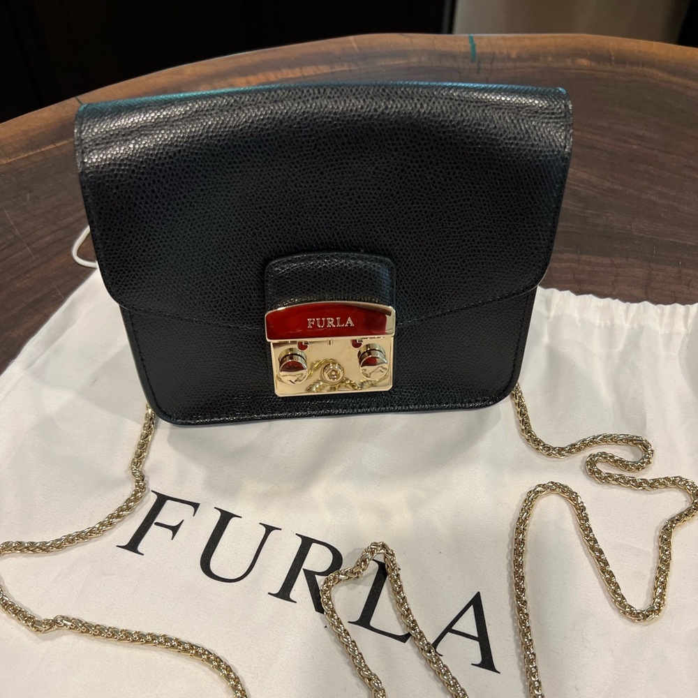 Furla black evening bag with gold colored hardware